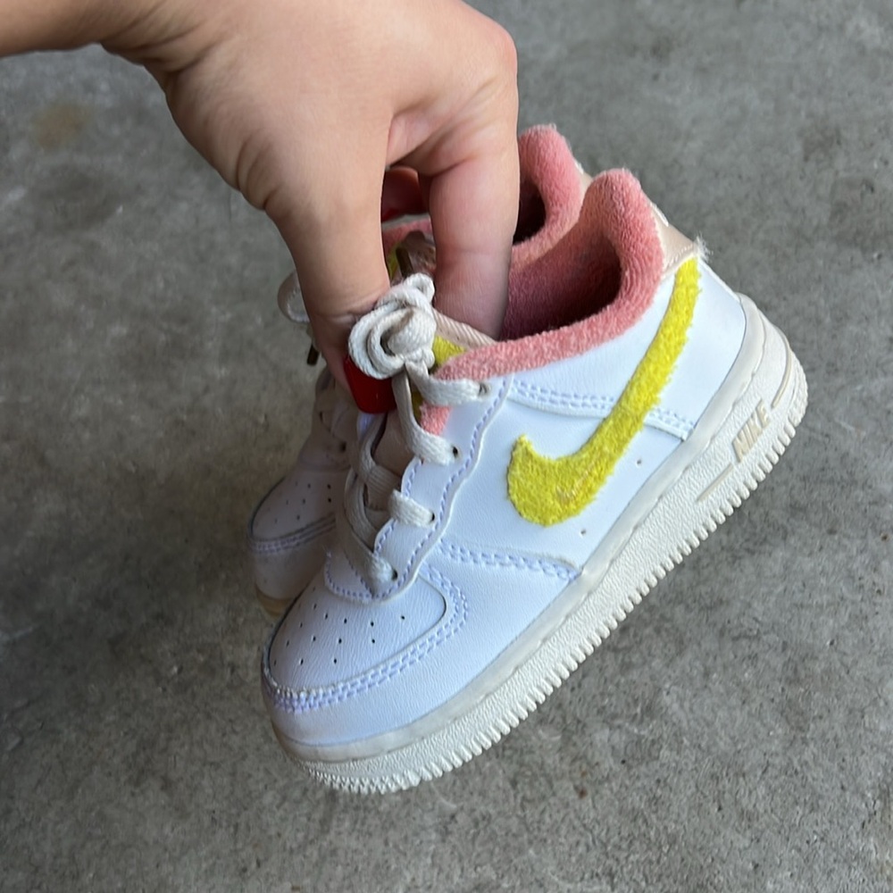 Nike Kids White Sneakers with Pink and Yellow Accents